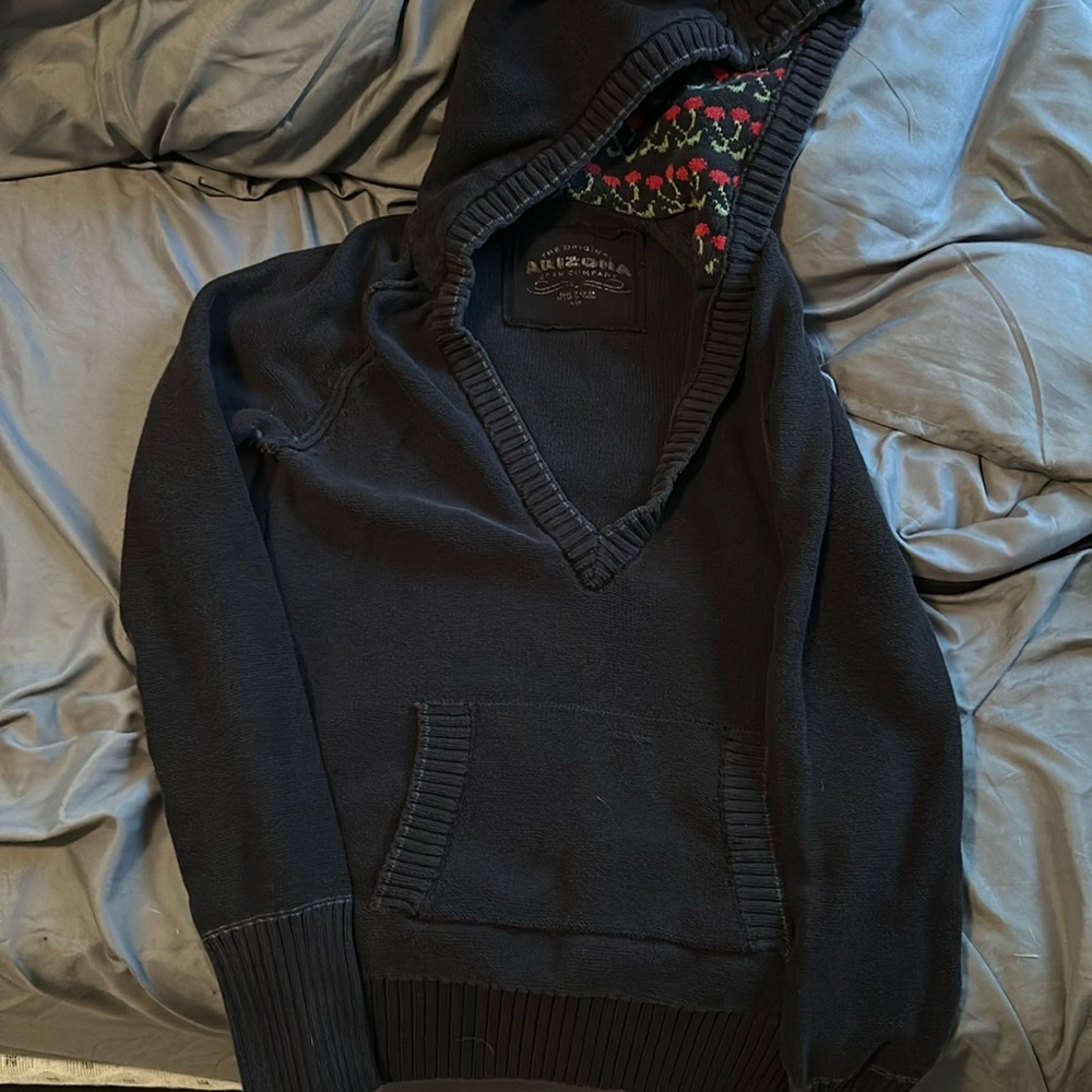 woman’s pull over sweater with a hood and hood zipper